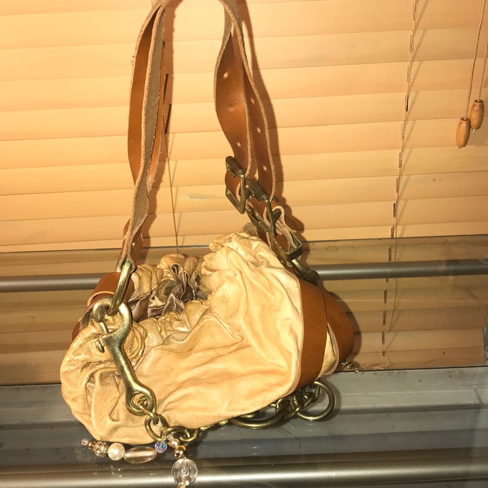 Super cute and unique metallic leather handbag